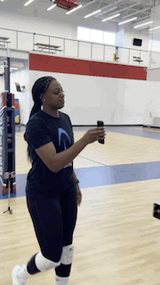 Coach reviewing live data on their phone